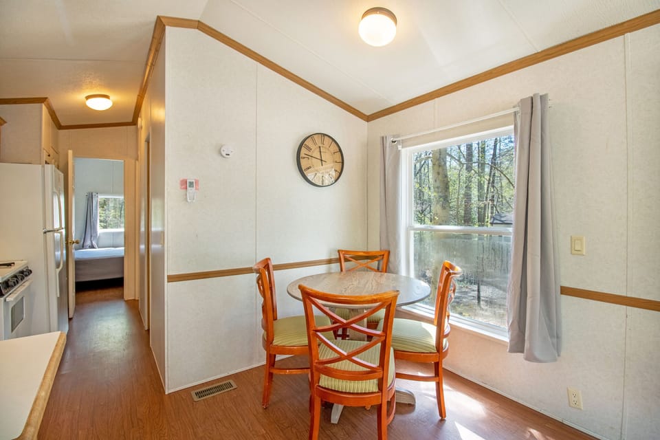 And a small dining area with seating for 4