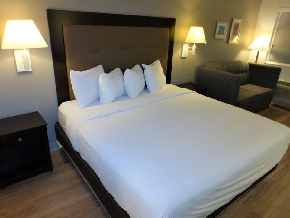 Premium bedding, memory foam beds, desk, blackout drapes