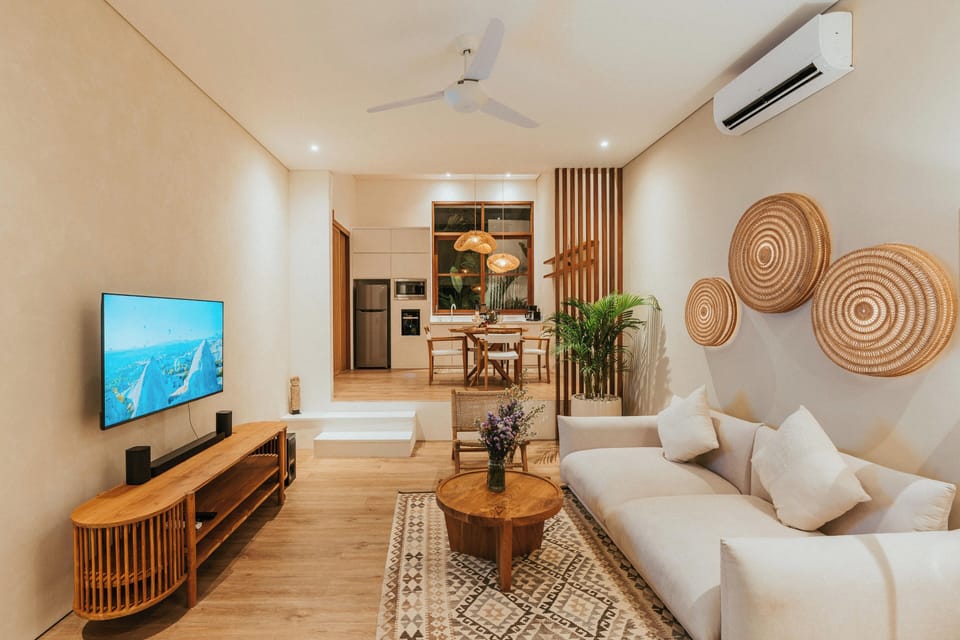 Spacious living room with cozy seating and modern interior design.