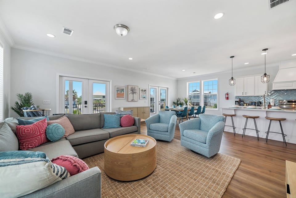 You won't miss out on conversation in the open living room, dining and kitchen area.