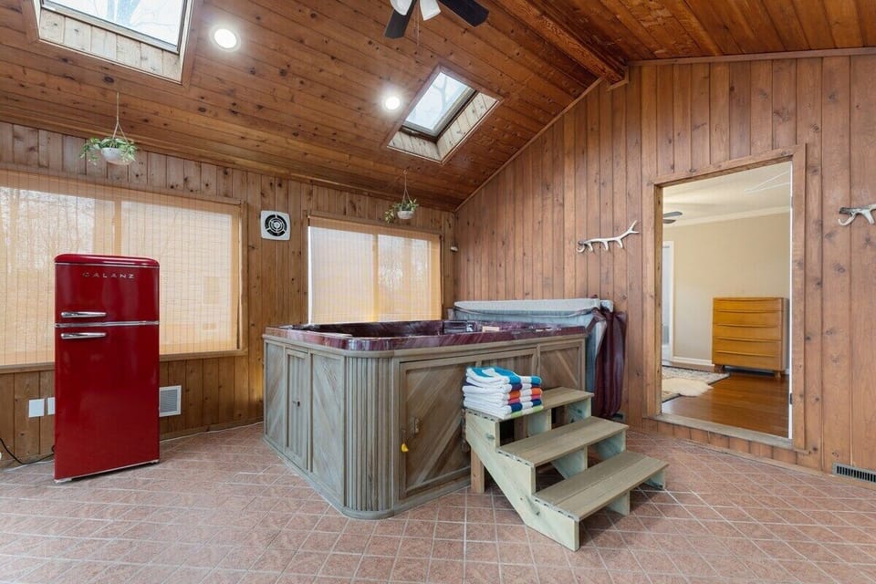 Relax in the spacious spa room with a 4-6 person hot tub