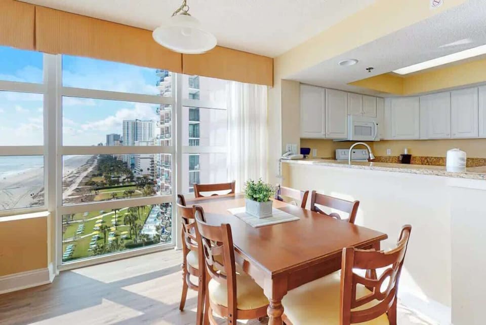 Share stories and laughter in this cozy, well-lit dining area.