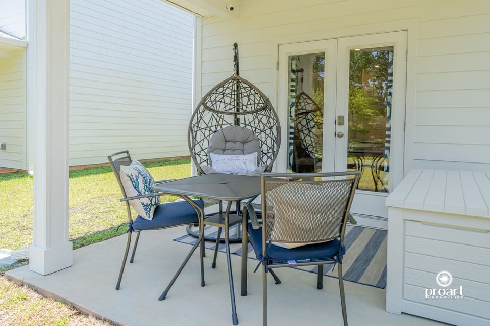 The peaceful backyard oasis, perfect for morning coffee or afternoon playtime.