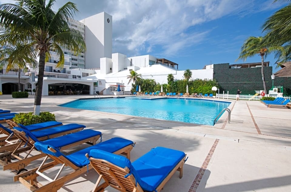 Outdoor pool with chairs
