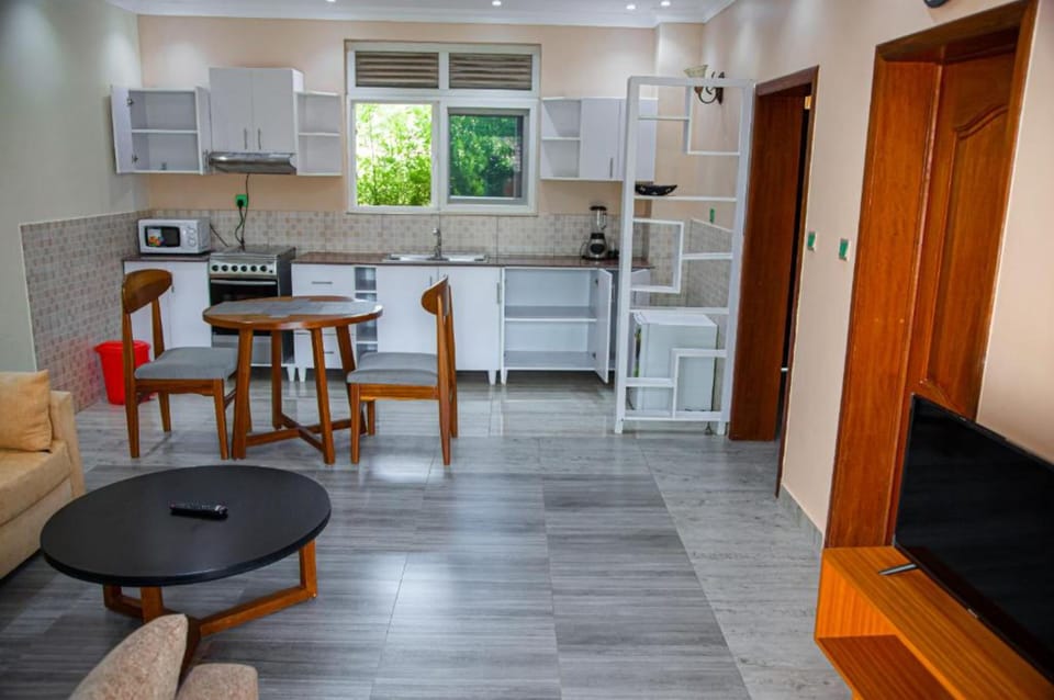 Deluxe Double Room | Living area | TV
