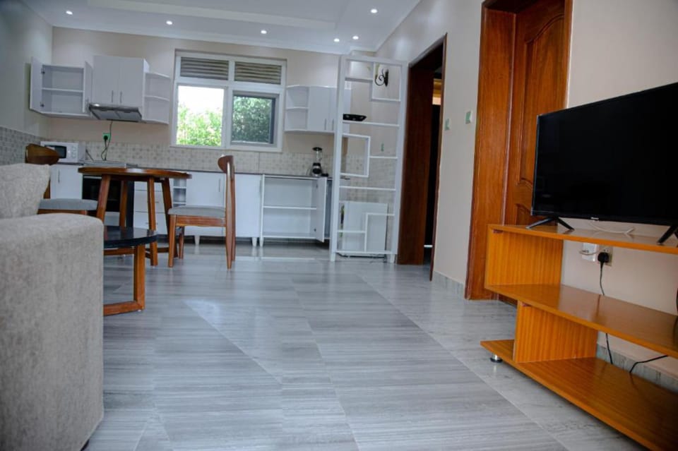 Deluxe Double Room | Living area | TV