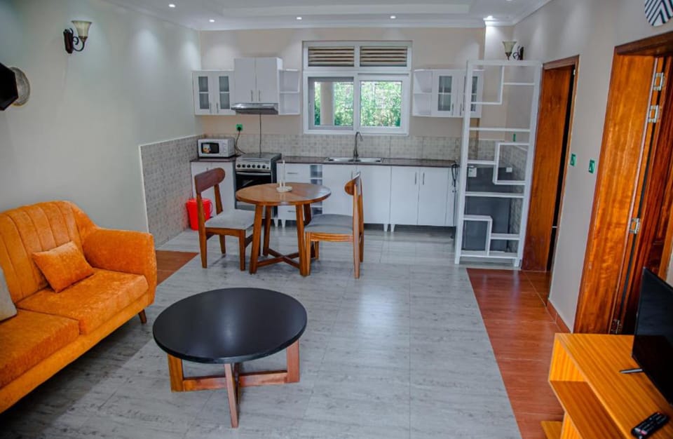 Deluxe Double Room | Living area | TV