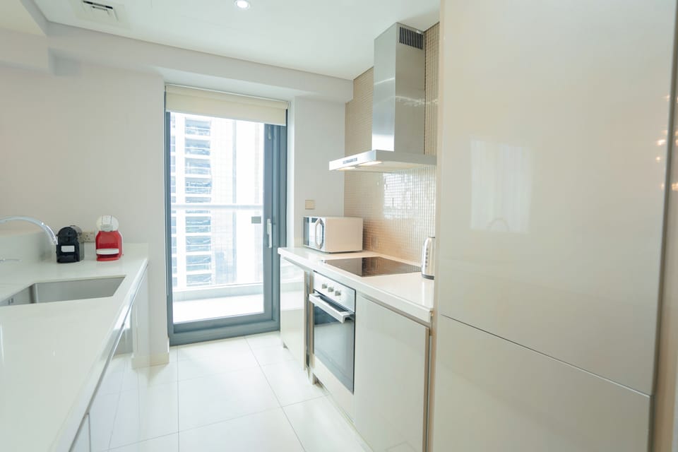 Exclusive Apartment, Balcony, City View | Private kitchen | Fridge, microwave, oven, dishwasher