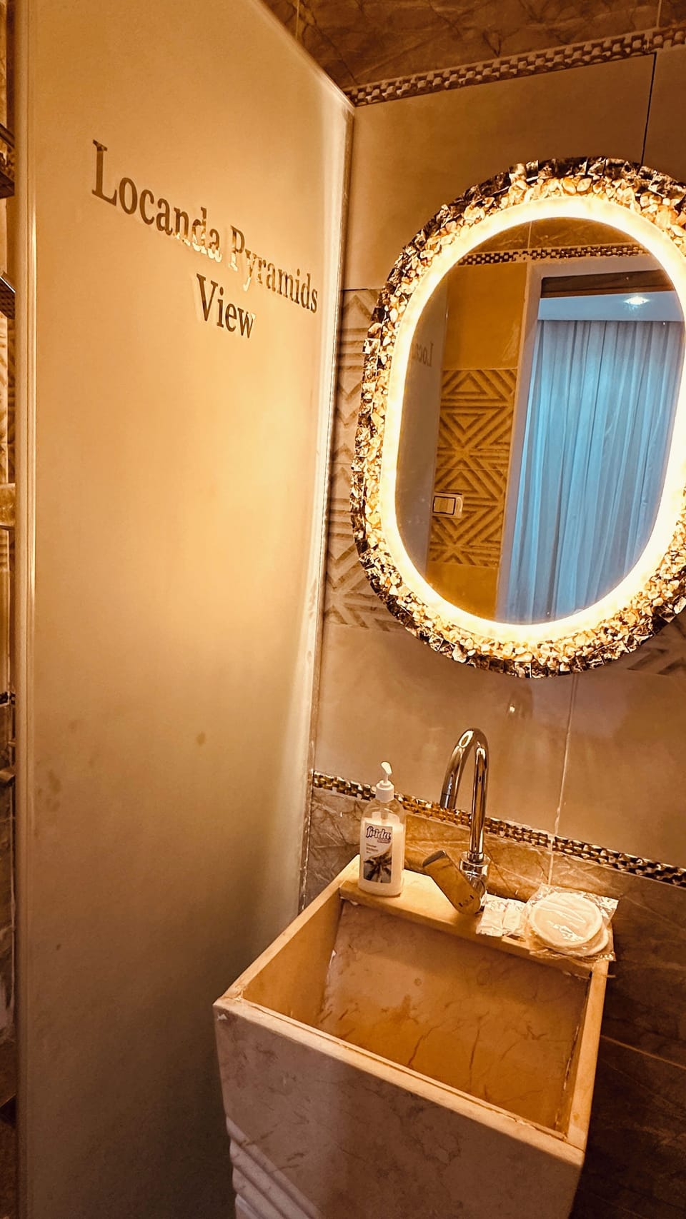 Jetted tub, rainfall showerhead, designer toiletries, hair dryer
