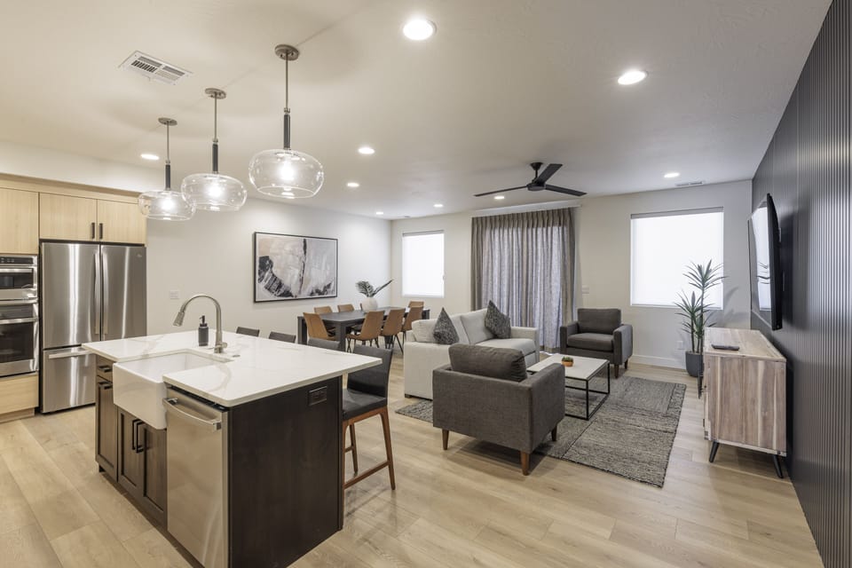 View From Kitchen - The Living Room is conveniently located adjacent to the Kitchen and Dining Table and is a great place for entertaining guests during downtime.