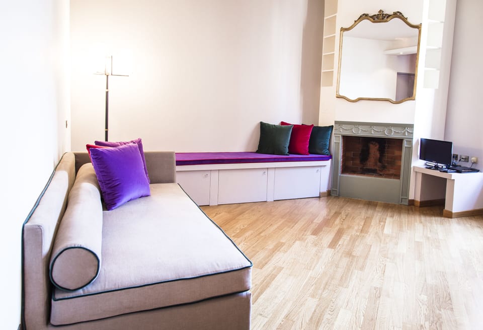 Apartment, 1 Bedroom | Living area | 40-inch flat-screen TV with digital channels