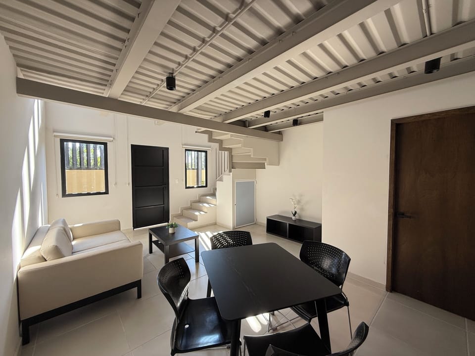 Classic Loft, 2 Double Beds | Living area | 35-inch Smart TV with digital channels