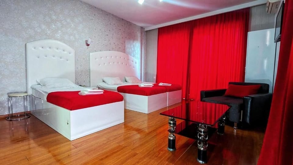 Triple Room | Minibar, iron/ironing board, free WiFi, bed sheets