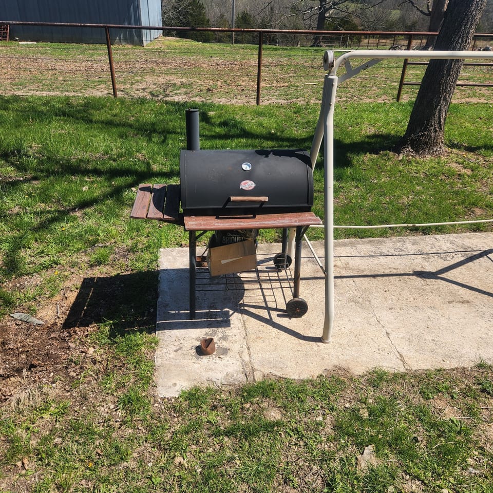 Charcoal bbq grill out back