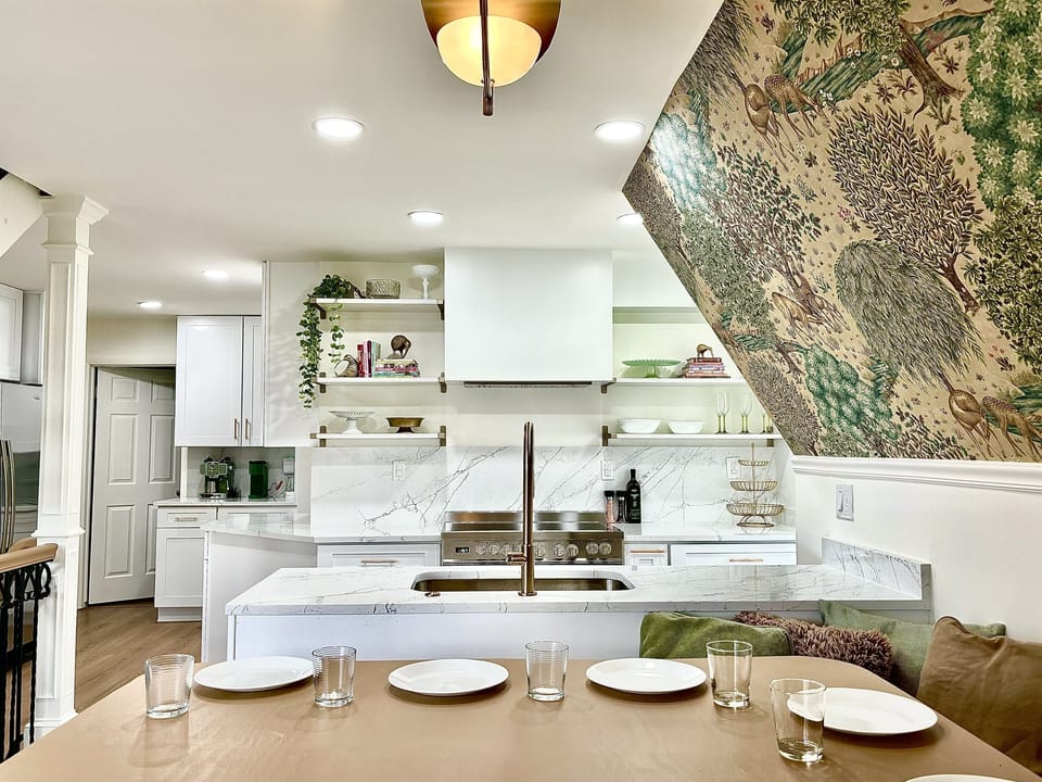 The dining nook is right next to the kitchen making serving food a breeze.
