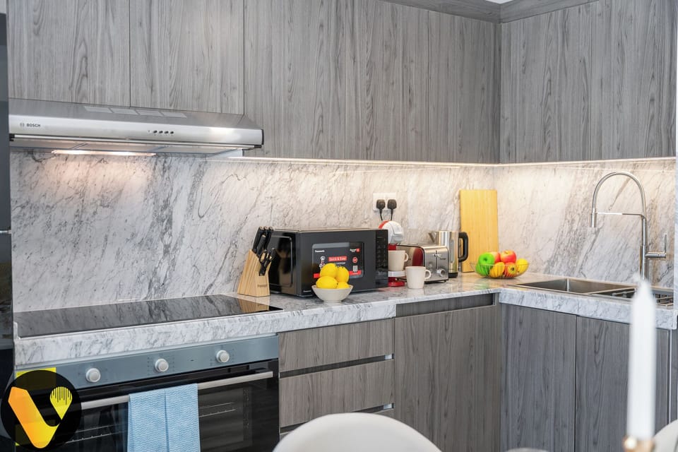 Luxury Villa | Private kitchen | Full-size fridge, microwave, oven, stovetop