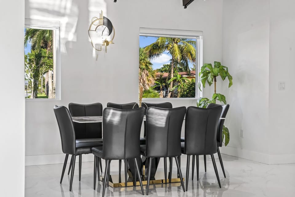 Rent this chic home with a stunning dining room