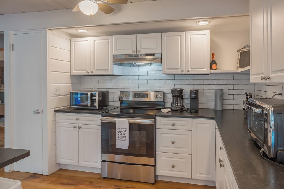 The spacious kitchen is fully equiped.