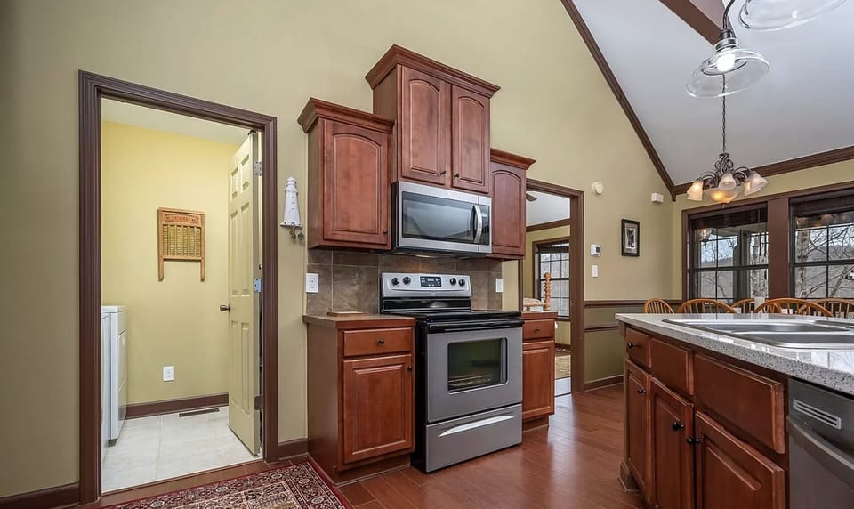 Kitchen is outfitted with an Electric Smooth Top Range