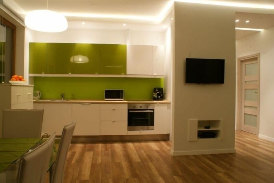 Apartment, 2 Bedrooms (Olive Suite) | Private kitchen | Coffee/tea maker, full-size fridge, stovetop, dishwasher