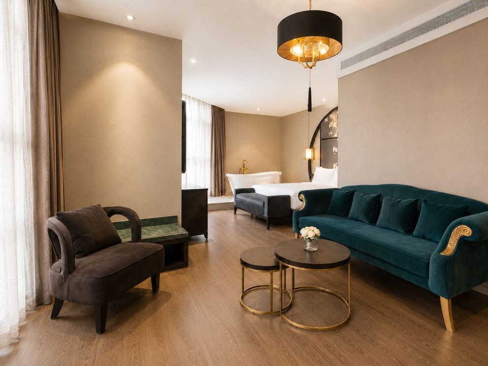 Luxury Suite | Down comforters, minibar (free items), desk, soundproofing