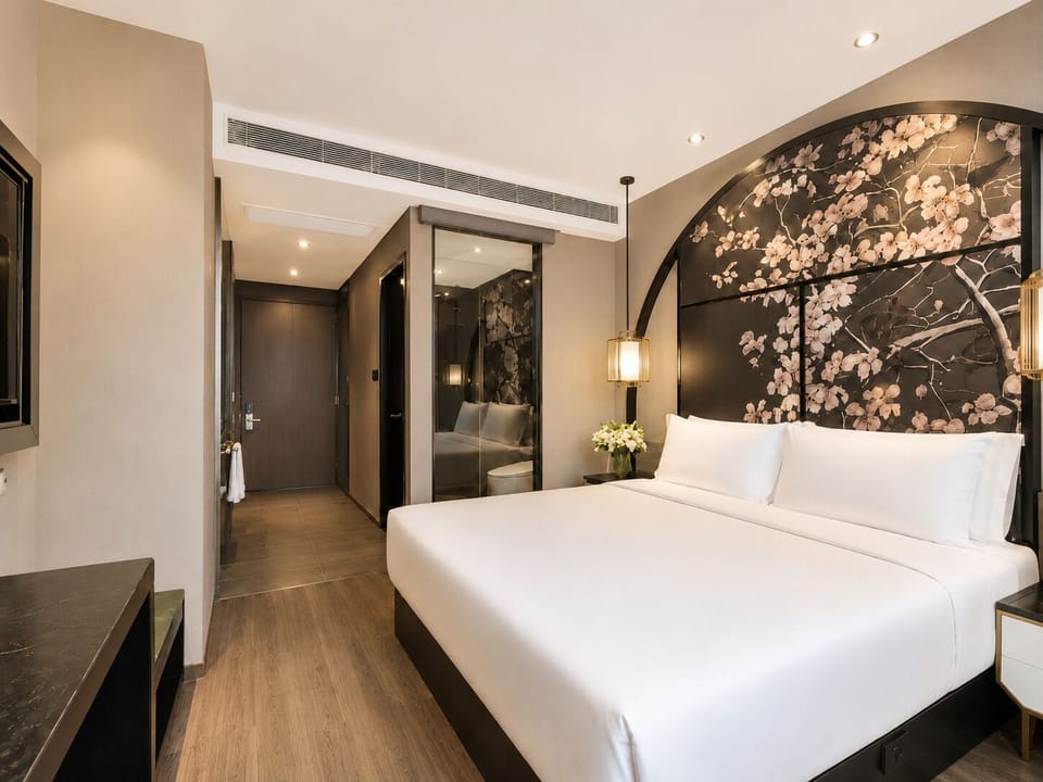 Business Double Room Single Use | Living area | 55-inch TV with digital channels