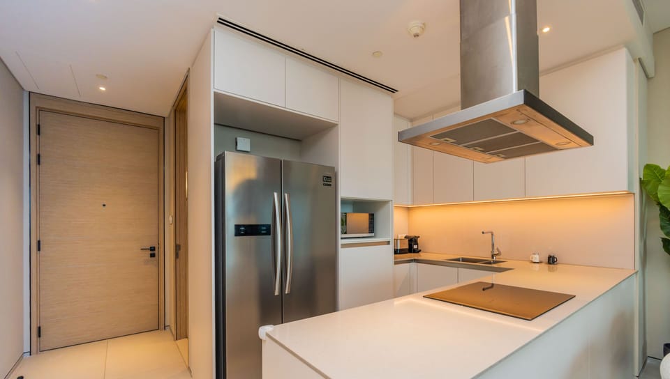 Design Apartment, Balcony, Sea View | Private kitchen | Coffee/tea maker, fridge, microwave, dishwasher