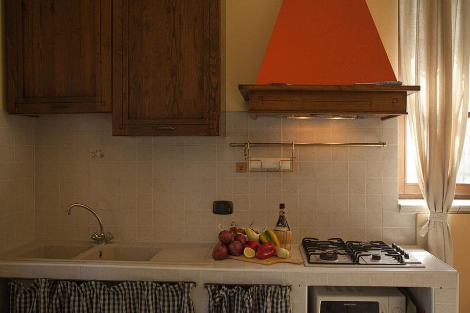 Apartment, 1 Bedroom, Garden View | Private kitchen | Full-size fridge, microwave, stovetop, coffee/tea maker