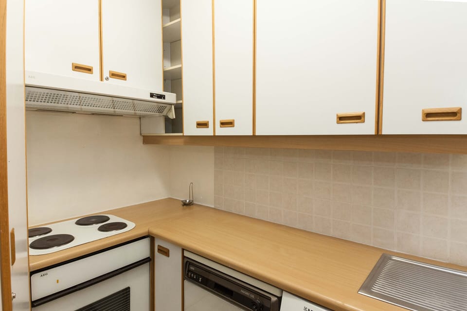 Apartment | Private kitchen | Full-size fridge, oven, toaster, cookware/dishes/utensils