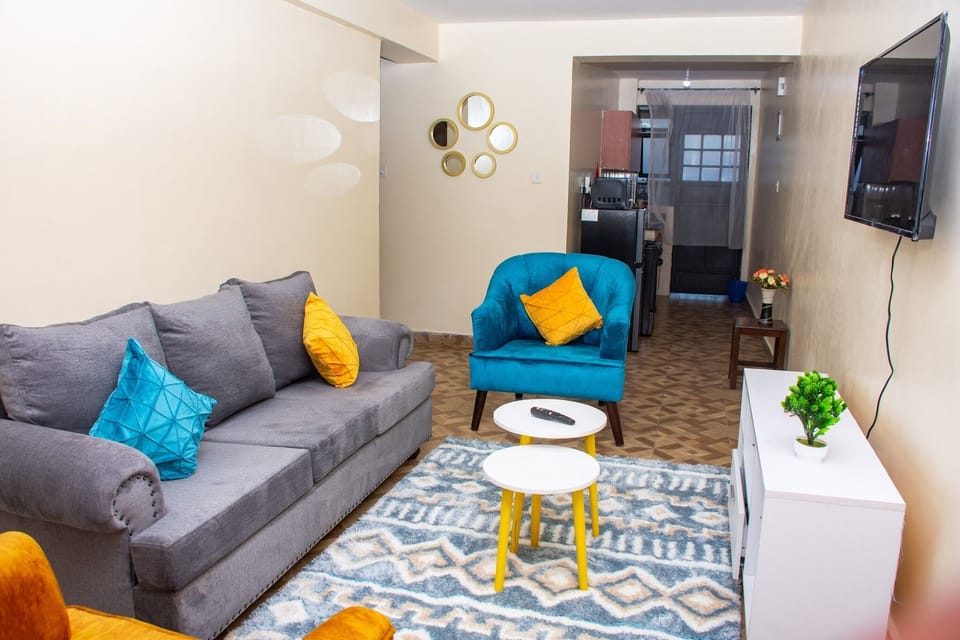 City Apartment | Living area | 24-inch Smart TV with digital channels