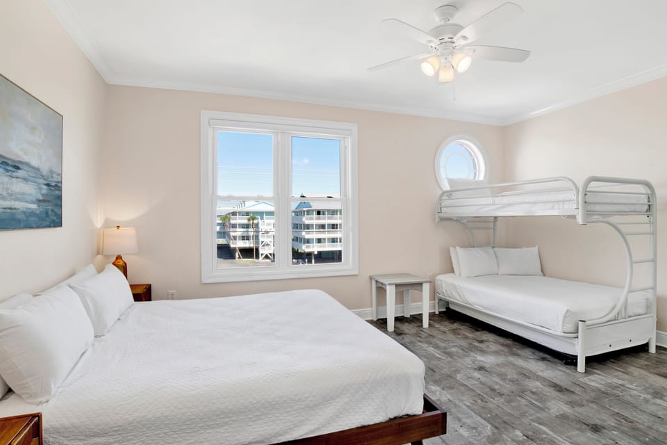 Bedroom 5 has a TV, private bathroom, King bed and Twin over Full bunk bed - sleeps 5