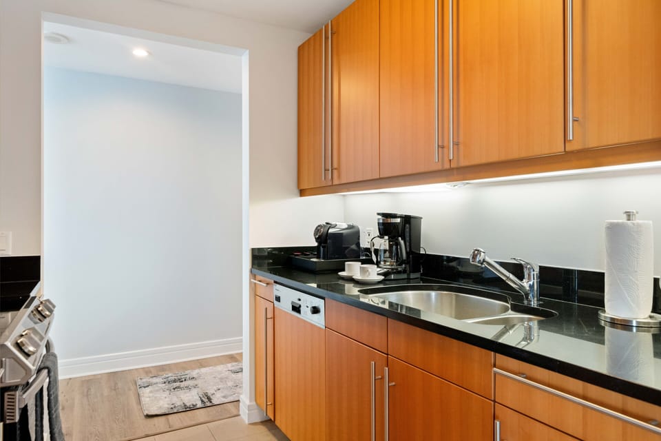 Lofty Kitchen of the Condo in Miami Florida - Full equipped  - High-quality appliances and fixtures for effortless meal preparation - Stainless steel appliances