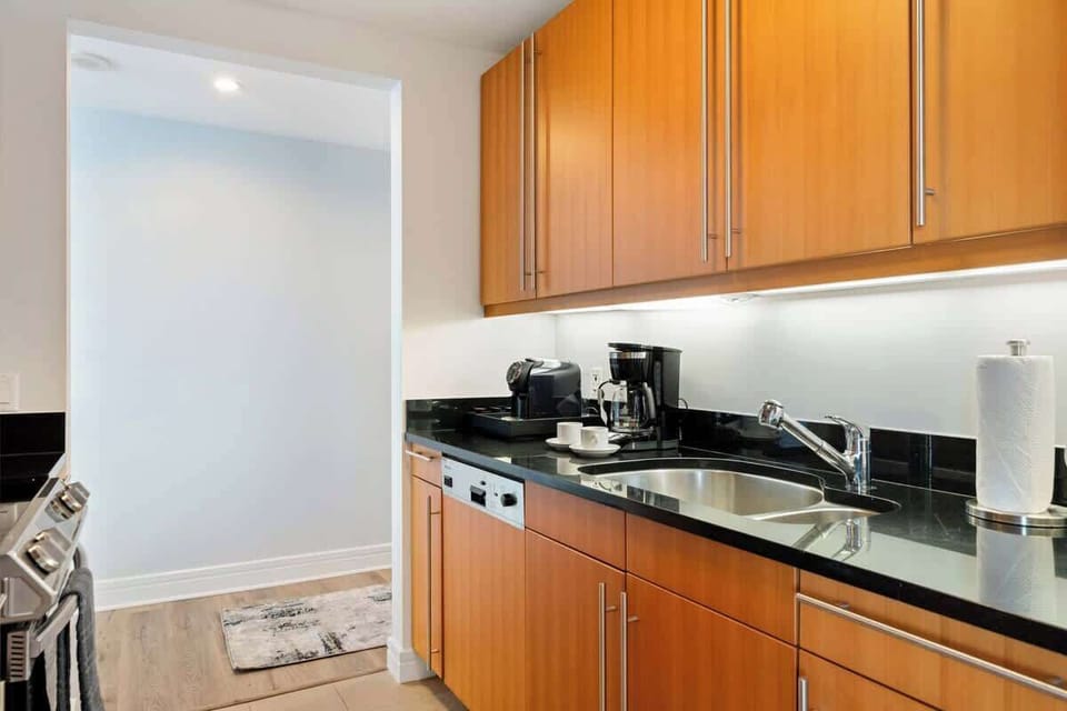 Lofty Kitchen of the Condo in Miami Florida - Full equipped  - High-quality appliances and fixtures for effortless meal preparation - Stainless steel appliances