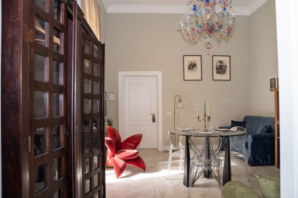 Deluxe Suite, Balcony, Garden View | Frette Italian sheets, premium bedding, down comforters, minibar