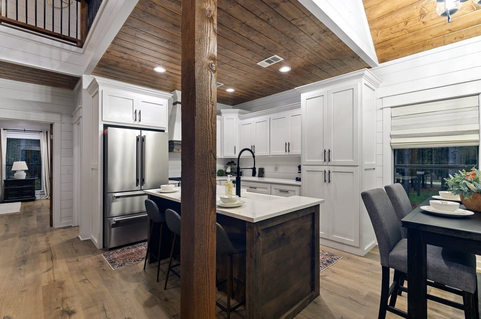 This kitchen is cozy, compact, but efficient! You'll always be a part of the action with it being just off the living room.