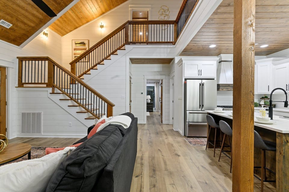 Entering the front door you immediately feel a cozy comfort from the connectedness of the spaces along with the colors and furnishings of the cabin.