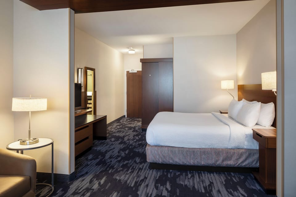 Premium bedding, down comforters, pillowtop beds, desk