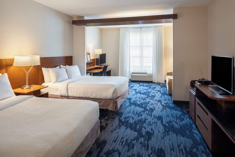 Suite, Multiple Beds | Premium bedding, down comforters, pillowtop beds, desk