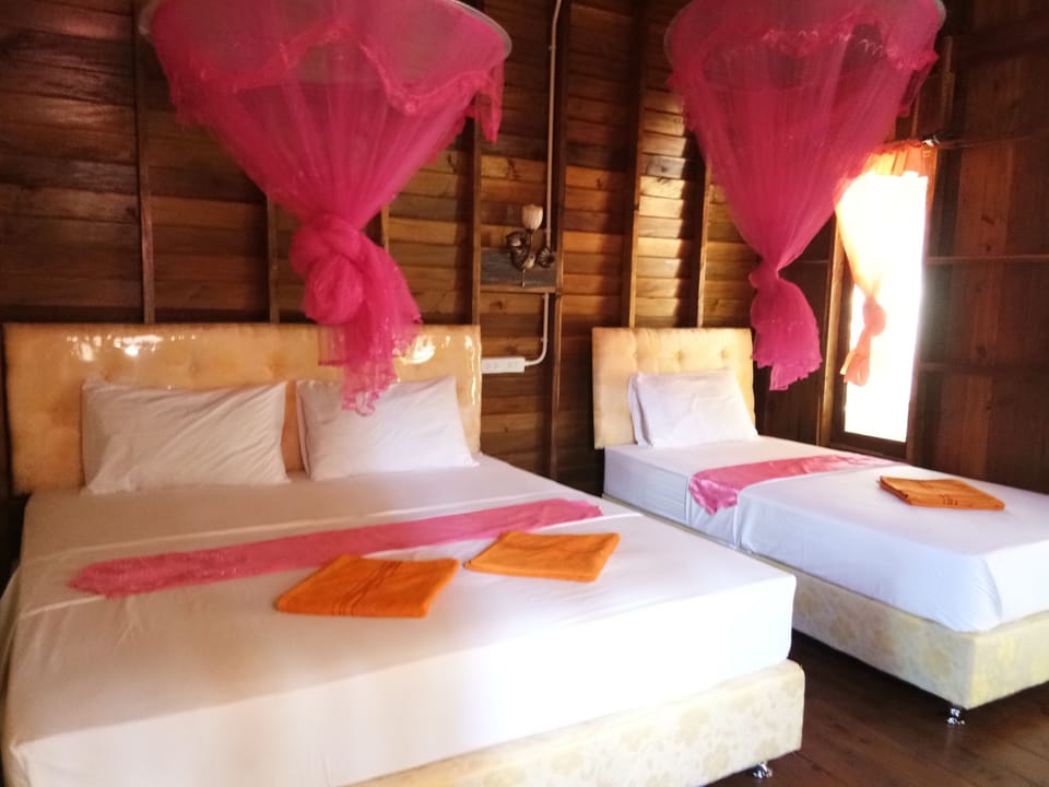 Triple Room | Select Comfort beds, desk, laptop workspace, blackout drapes