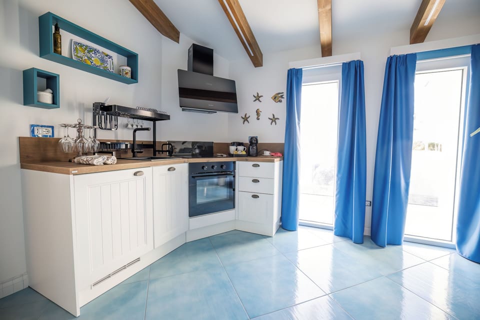 Luxury Studio Suite | Private kitchen | Fridge, espresso maker, electric kettle