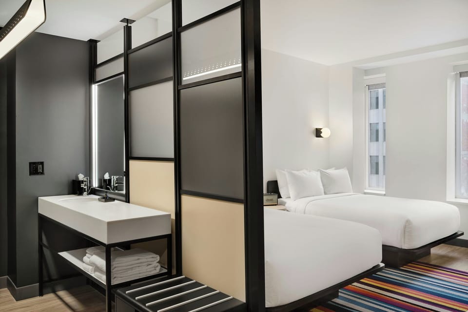 Room, 2 Queen Beds | Individually furnished, desk, laptop workspace, free WiFi