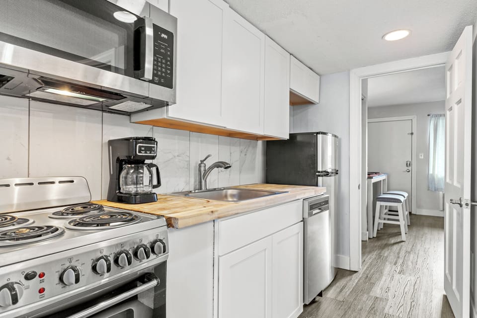 Culinary inspiration starts in the fully equipped kitchen of our chic suite!