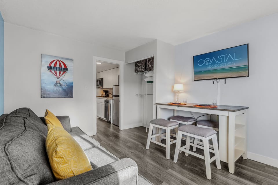 Seaside charm meets modern elegance in our stylish living area!
