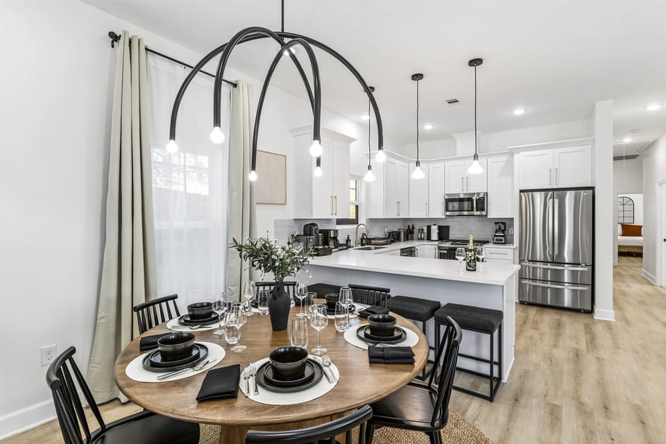 One table, every seat filled — dinners, card games, and the conversations your family will talk about for years.