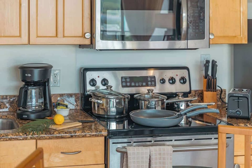 Kitchen equipped with full-size appliances for your culinary needs.