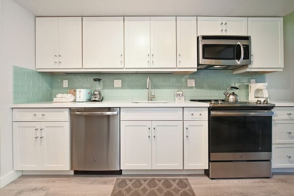 New cabinets, tile and appliances. Stocked  with all you need!
