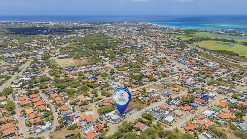 Aerial view of the property and neighborhood.