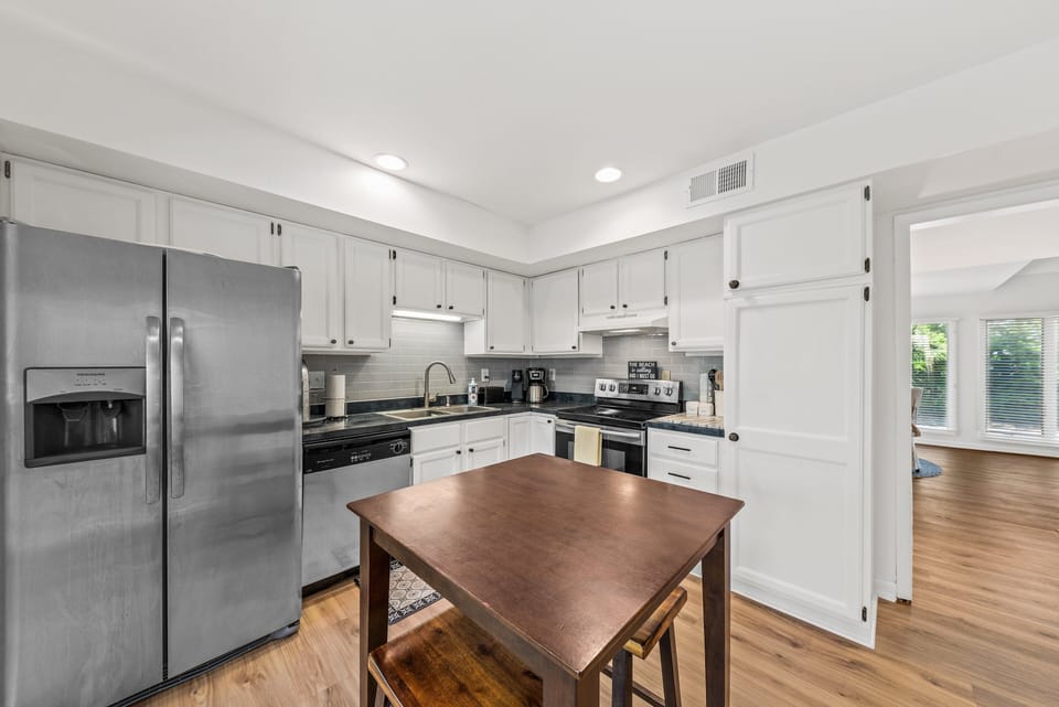 Kitchen with small island that seats 2