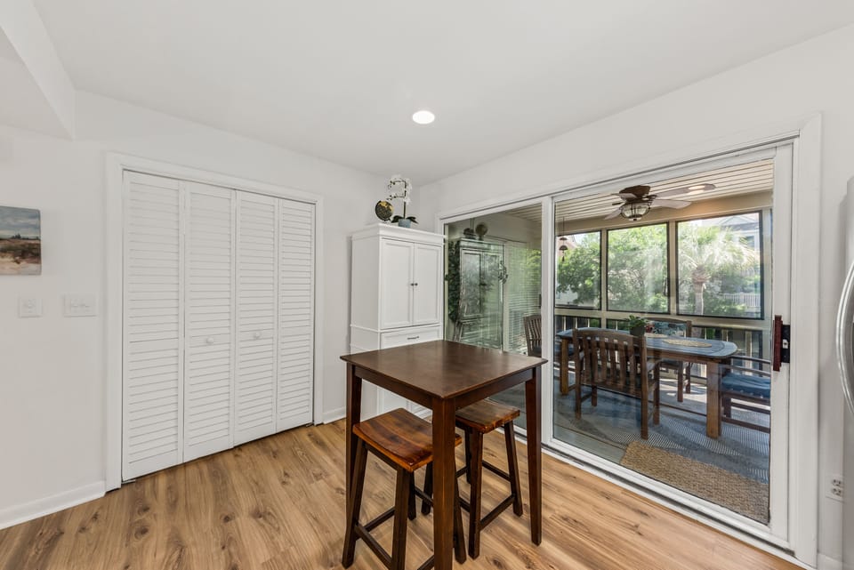 Screened porch off of the kitchen