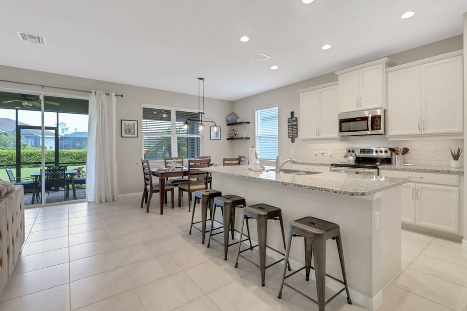 The living area opens to the kitchen and dining area, creating a great space for gathering together.